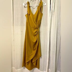 Free people wrap dress: gold shimmering fabric.small.